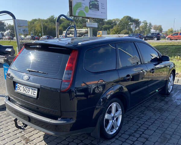 Черный Форд Фокус, объемом двигателя 2 л и пробегом 293 тыс. км за 4050 $, фото 2 на Automoto.ua