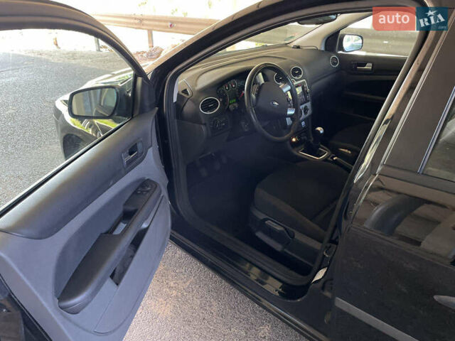 Черный Форд Фокус, объемом двигателя 1.6 л и пробегом 206 тыс. км за 4700 $, фото 5 на Automoto.ua