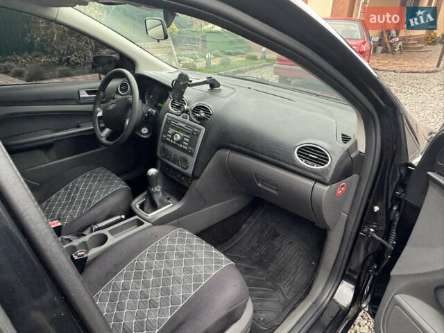 Черный Форд Фокус, объемом двигателя 1.6 л и пробегом 220 тыс. км за 2100 $, фото 22 на Automoto.ua