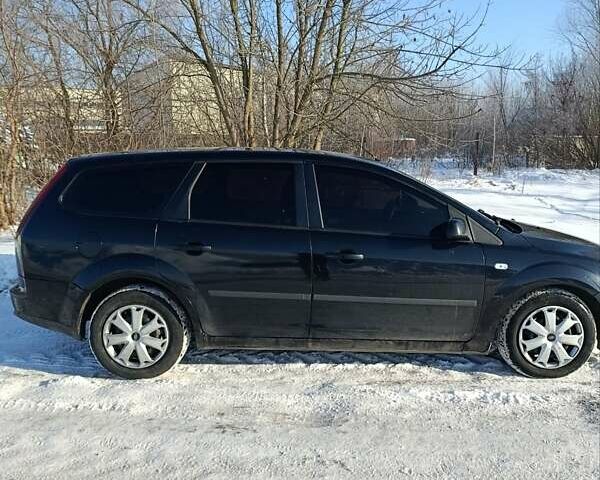 Черный Форд Фокус, объемом двигателя 1.6 л и пробегом 235 тыс. км за 4200 $, фото 2 на Automoto.ua