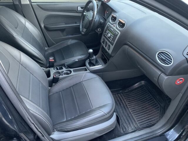 Черный Форд Фокус, объемом двигателя 1.6 л и пробегом 162 тыс. км за 5400 $, фото 16 на Automoto.ua