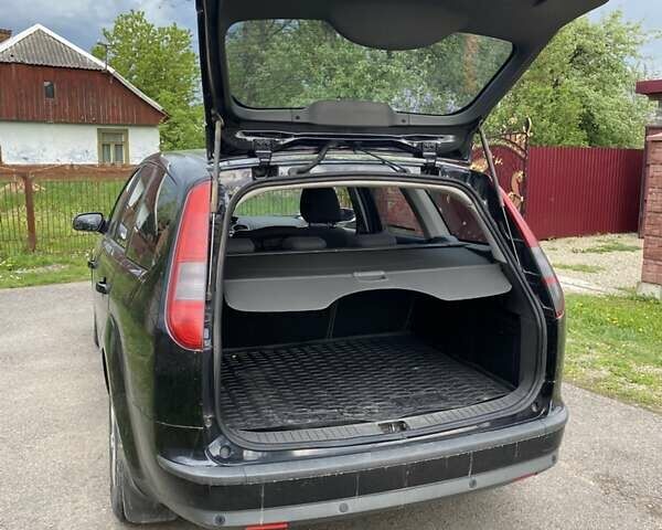 Черный Форд Фокус, объемом двигателя 1.6 л и пробегом 210 тыс. км за 4500 $, фото 3 на Automoto.ua