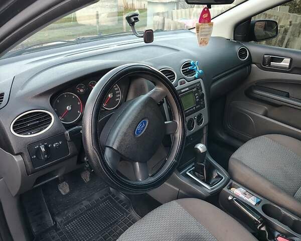 Черный Форд Фокус, объемом двигателя 1.56 л и пробегом 303 тыс. км за 3700 $, фото 4 на Automoto.ua