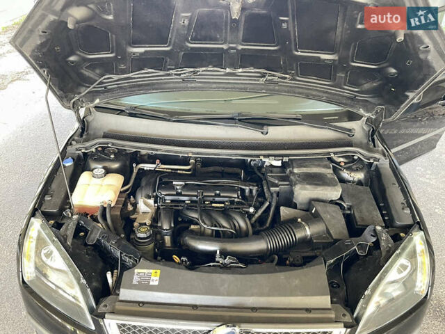 Черный Форд Фокус, объемом двигателя 1.6 л и пробегом 206 тыс. км за 4700 $, фото 11 на Automoto.ua