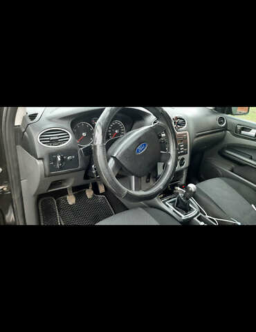 Черный Форд Фокус, объемом двигателя 1.6 л и пробегом 298 тыс. км за 3800 $, фото 6 на Automoto.ua