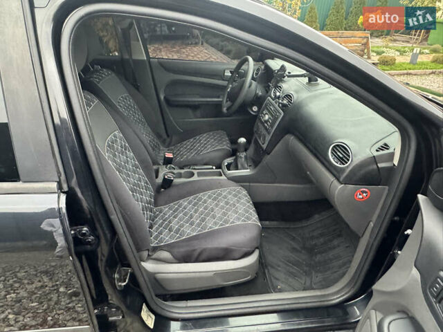 Черный Форд Фокус, объемом двигателя 1.6 л и пробегом 220 тыс. км за 2100 $, фото 21 на Automoto.ua