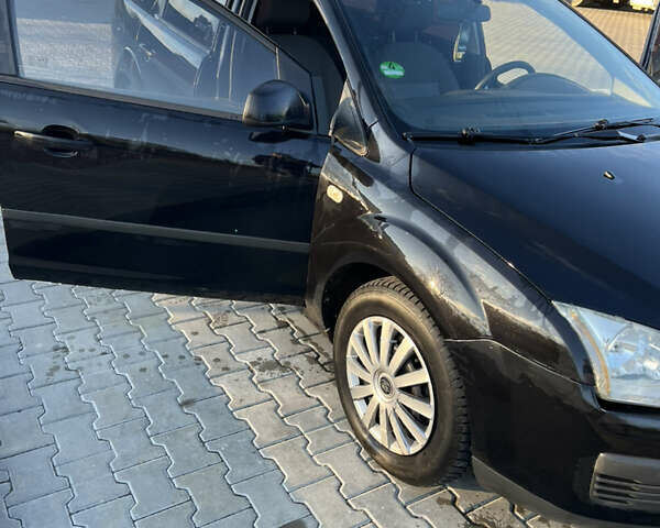 Черный Форд Фокус, объемом двигателя 1.56 л и пробегом 305 тыс. км за 4200 $, фото 4 на Automoto.ua