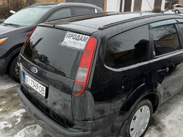 Чорний Форд Фокус, об'ємом двигуна 2 л та пробігом 288 тис. км за 4200 $, фото 2 на Automoto.ua