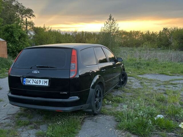 Черный Форд Фокус, объемом двигателя 1.8 л и пробегом 340 тыс. км за 4200 $, фото 5 на Automoto.ua