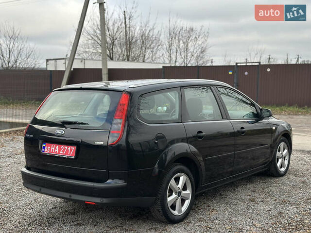 Черный Форд Фокус, объемом двигателя 1.8 л и пробегом 188 тыс. км за 5600 $, фото 12 на Automoto.ua