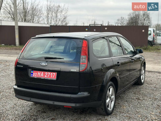 Черный Форд Фокус, объемом двигателя 1.8 л и пробегом 188 тыс. км за 5600 $, фото 10 на Automoto.ua