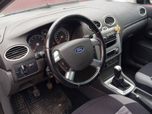 Черный Форд Фокус, объемом двигателя 1.6 л и пробегом 250 тыс. км за 4700 $, фото 6 на Automoto.ua