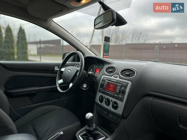 Черный Форд Фокус, объемом двигателя 1.8 л и пробегом 188 тыс. км за 5600 $, фото 39 на Automoto.ua