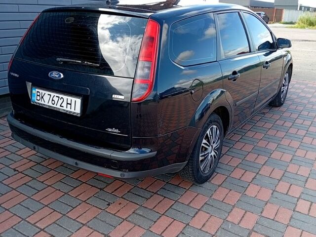 Черный Форд Фокус, объемом двигателя 1.6 л и пробегом 270 тыс. км за 4600 $, фото 1 на Automoto.ua