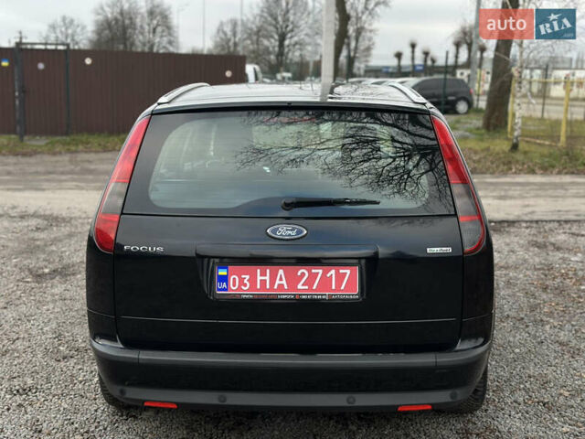 Черный Форд Фокус, объемом двигателя 1.8 л и пробегом 188 тыс. км за 5600 $, фото 13 на Automoto.ua