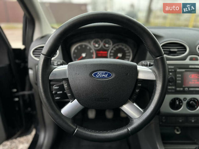 Черный Форд Фокус, объемом двигателя 1.8 л и пробегом 188 тыс. км за 5600 $, фото 26 на Automoto.ua