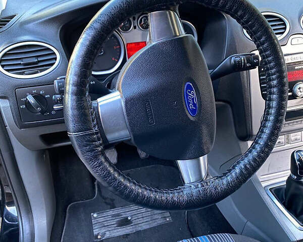 Черный Форд Фокус, объемом двигателя 1.56 л и пробегом 223 тыс. км за 4550 $, фото 13 на Automoto.ua