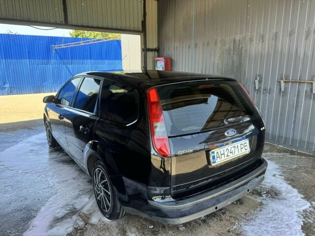 Черный Форд Фокус, объемом двигателя 2 л и пробегом 300 тыс. км за 4500 $, фото 2 на Automoto.ua