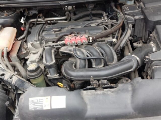 Черный Форд Фокус, объемом двигателя 1.6 л и пробегом 250 тыс. км за 4700 $, фото 4 на Automoto.ua