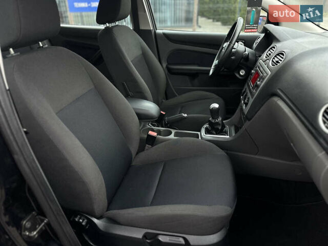 Черный Форд Фокус, объемом двигателя 1.8 л и пробегом 188 тыс. км за 5600 $, фото 41 на Automoto.ua