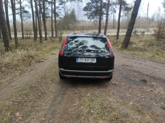 Черный Форд Фокус, объемом двигателя 1.8 л и пробегом 300 тыс. км за 2400 $, фото 3 на Automoto.ua