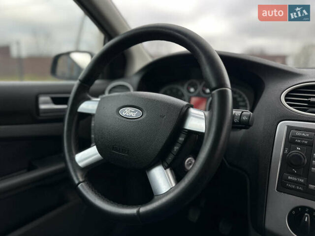 Черный Форд Фокус, объемом двигателя 1.8 л и пробегом 188 тыс. км за 5600 $, фото 44 на Automoto.ua