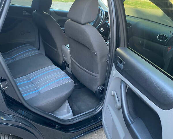 Черный Форд Фокус, объемом двигателя 1.56 л и пробегом 223 тыс. км за 4550 $, фото 18 на Automoto.ua