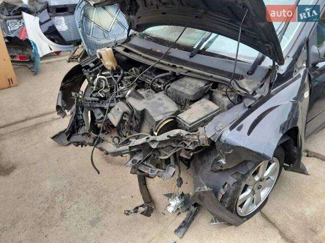 Черный Форд Фокус, объемом двигателя 1.39 л и пробегом 160 тыс. км за 1400 $, фото 5 на Automoto.ua