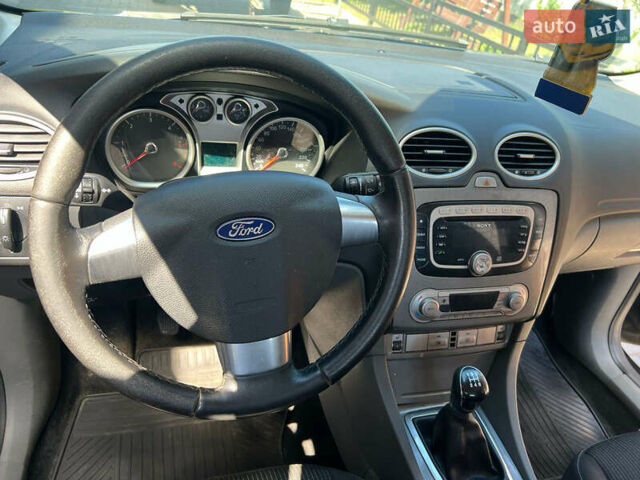 Черный Форд Фокус, объемом двигателя 1.6 л и пробегом 181 тыс. км за 5300 $, фото 7 на Automoto.ua