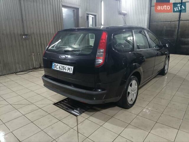 Черный Форд Фокус, объемом двигателя 1.6 л и пробегом 283 тыс. км за 4550 $, фото 6 на Automoto.ua