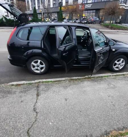 Черный Форд Фокус, объемом двигателя 1.6 л и пробегом 300 тыс. км за 4730 $, фото 2 на Automoto.ua