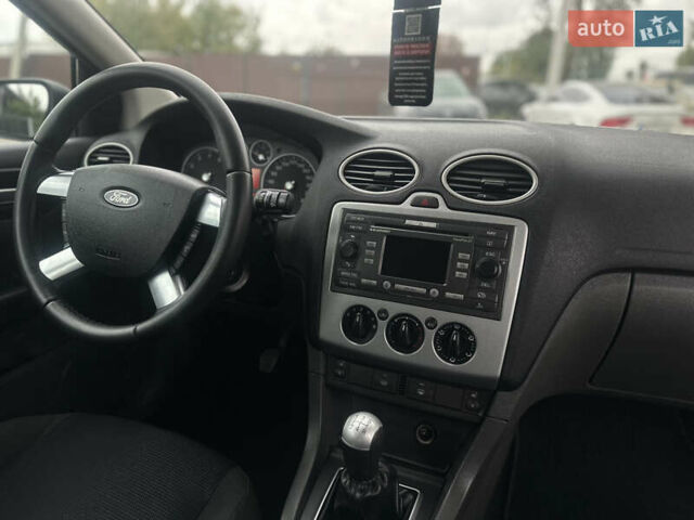 Черный Форд Фокус, объемом двигателя 1.8 л и пробегом 188 тыс. км за 5600 $, фото 46 на Automoto.ua