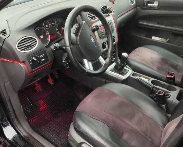 Черный Форд Фокус, объемом двигателя 1.6 л и пробегом 286 тыс. км за 4800 $, фото 5 на Automoto.ua