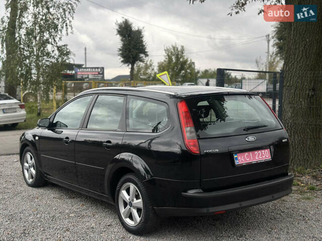 Черный Форд Фокус, объемом двигателя 1.8 л и пробегом 188 тыс. км за 5600 $, фото 11 на Automoto.ua