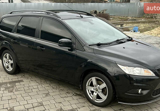 Чорний Форд Фокус, об'ємом двигуна 1.6 л та пробігом 318 тис. км за 4799 $, фото 6 на Automoto.ua