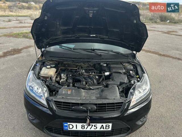 Черный Форд Фокус, объемом двигателя 1.6 л и пробегом 355 тыс. км за 4600 $, фото 5 на Automoto.ua