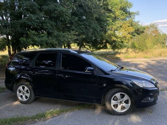 Чорний Форд Фокус, об'ємом двигуна 2 л та пробігом 310 тис. км за 5800 $, фото 5 на Automoto.ua