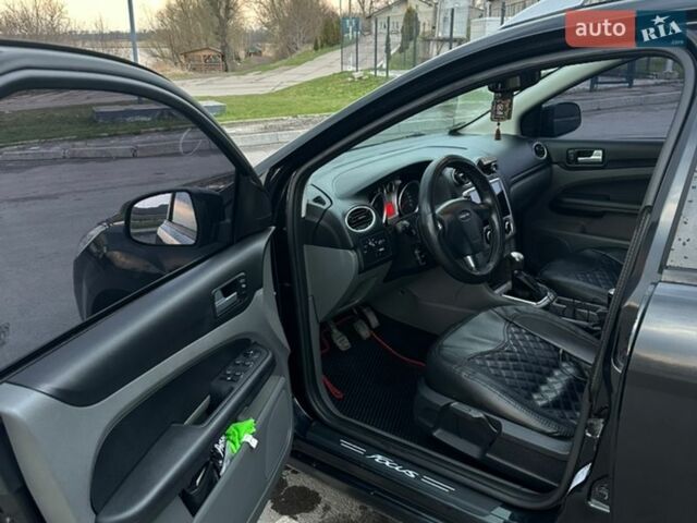 Чорний Форд Фокус, об'ємом двигуна 1.6 л та пробігом 295 тис. км за 5599 $, фото 14 на Automoto.ua