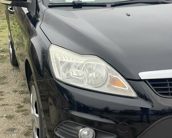 Черный Форд Фокус, объемом двигателя 1.6 л и пробегом 223 тыс. км за 6400 $, фото 6 на Automoto.ua