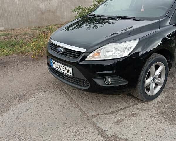 Черный Форд Фокус, объемом двигателя 1.6 л и пробегом 215 тыс. км за 5550 $, фото 5 на Automoto.ua