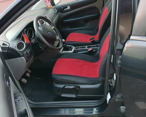 Черный Форд Фокус, объемом двигателя 1.56 л и пробегом 283 тыс. км за 5300 $, фото 8 на Automoto.ua