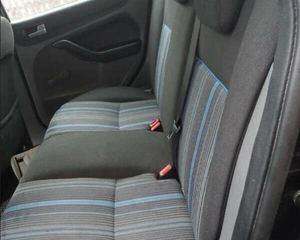 Черный Форд Фокус, объемом двигателя 1.56 л и пробегом 250 тыс. км за 4800 $, фото 4 на Automoto.ua