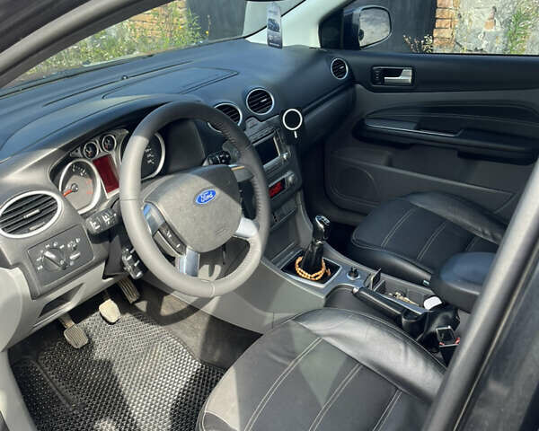 Черный Форд Фокус, объемом двигателя 1.6 л и пробегом 220 тыс. км за 5850 $, фото 4 на Automoto.ua