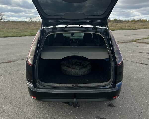 Черный Форд Фокус, объемом двигателя 1.6 л и пробегом 355 тыс. км за 4600 $, фото 6 на Automoto.ua