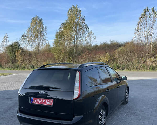 Черный Форд Фокус, объемом двигателя 1.6 л и пробегом 210 тыс. км за 4800 $, фото 4 на Automoto.ua