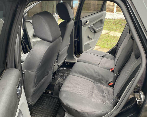 Чорний Форд Фокус, об'ємом двигуна 1.56 л та пробігом 239 тис. км за 5500 $, фото 4 на Automoto.ua