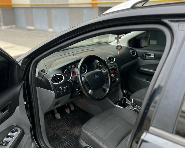 Чорний Форд Фокус, об'ємом двигуна 1.8 л та пробігом 244 тис. км за 5400 $, фото 7 на Automoto.ua
