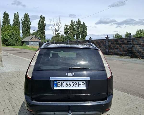 Черный Форд Фокус, объемом двигателя 1.56 л и пробегом 245 тыс. км за 5400 $, фото 2 на Automoto.ua