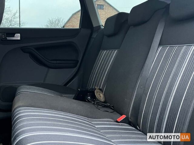 Черный Форд Фокус, объемом двигателя 1.6 л и пробегом 201 тыс. км за 5999 $, фото 11 на Automoto.ua