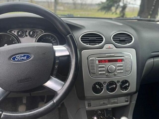 Черный Форд Фокус, объемом двигателя 1.8 л и пробегом 257 тыс. км за 4999 $, фото 10 на Automoto.ua